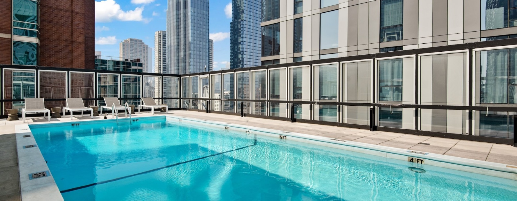 pool with lounge chairs