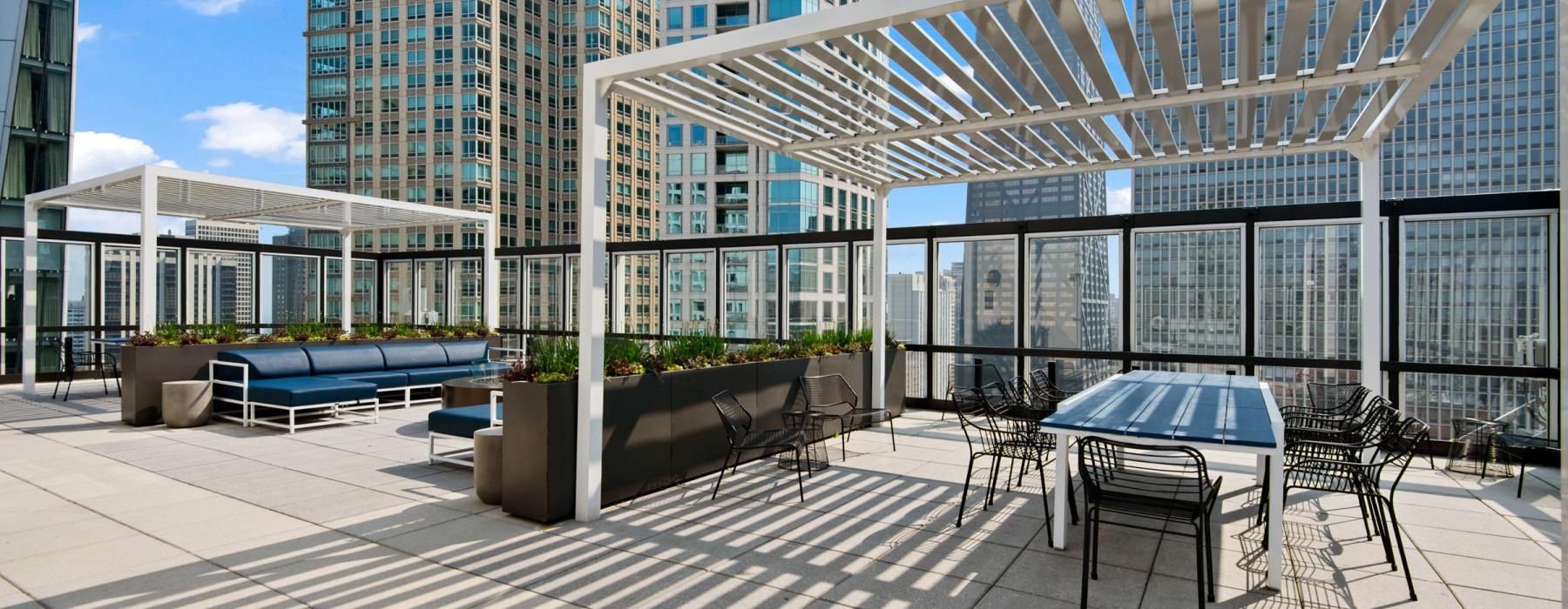 a courtyard with tables and chairs
